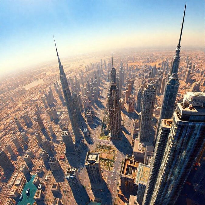 This stunning image showcases the grandeur of modern city architecture, featuring towering skyscrapers and a vibrant urban landscape.