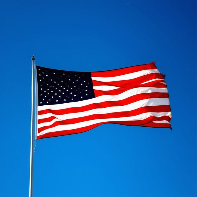 A vibrant scene of American patriotism, this wallpaper captures the essence of Independence Day with a clear blue sky as a backdrop for the unfurled flag. The stars and stripes stand out starkly against the azure expanse, symbolizing freedom and national pride.