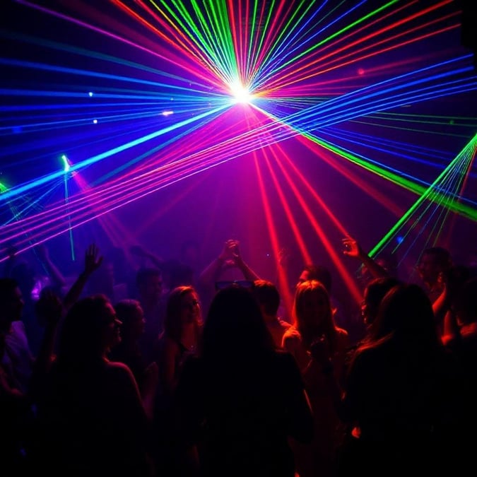 Get ready to groove with this mesmerizing laser light show wallpaper, perfect for music lovers and party enthusiasts alike.