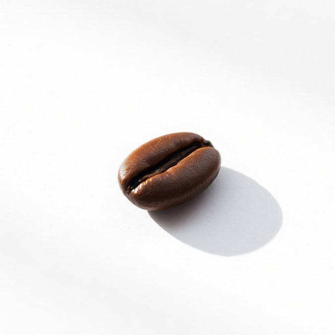 A simple yet elegant wallpaper featuring a single coffee bean, perfect for those who appreciate the beauty of minimalism.