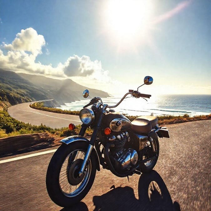 Enjoy the thrill of riding through breathtaking coastal scenery. The sun shines brightly over the ocean as you cruise on your favorite motorcycle.