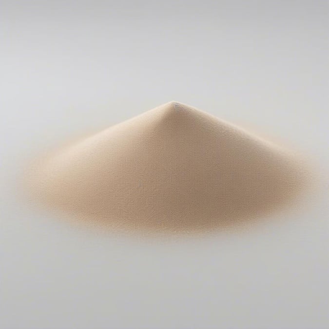 A simple yet elegant wallpaper featuring a small pile of sand in the center, perfect for those who appreciate minimalist design.