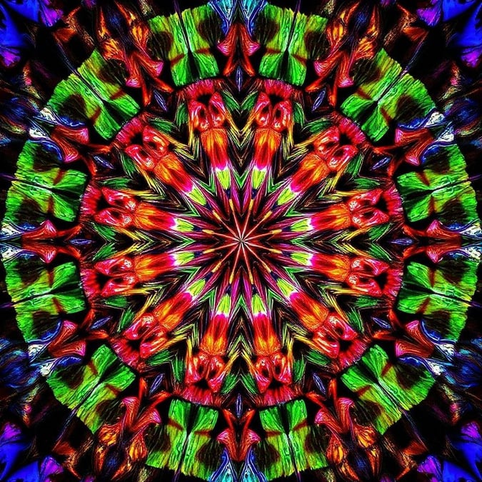 Get ready to immerse yourself in a world of vibrant colors and mesmerizing patterns with this psychedelic kaleidoscope wallpaper.