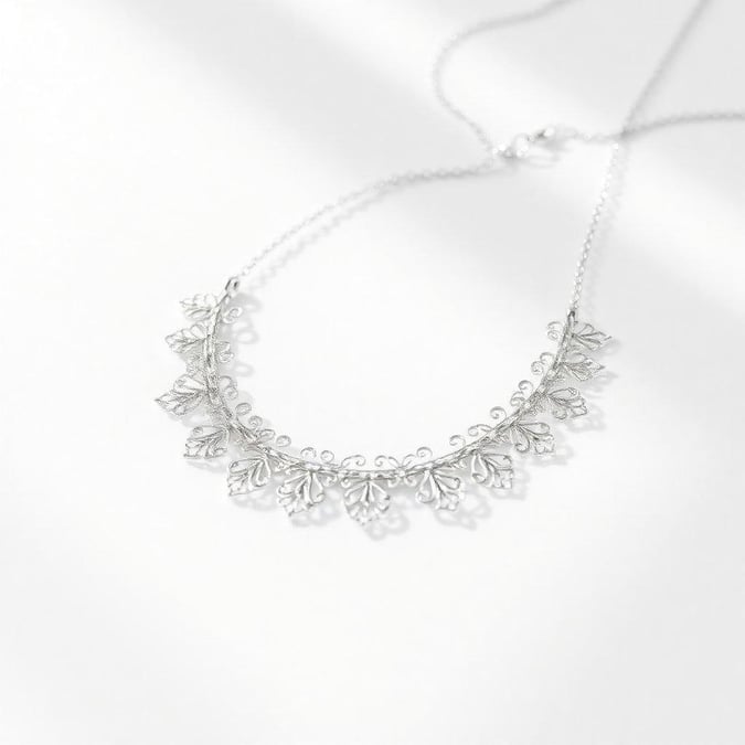 A beautifully crafted floral necklace with intricate detailing, a perfect accessory for minimalist style.