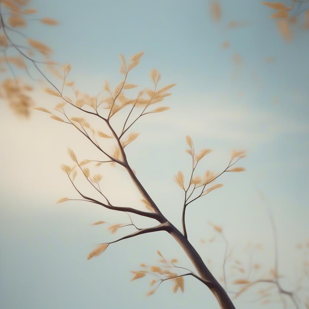 This minimalist tree wallpaper is perfect for those who want a simple yet elegant design for their desktop or mobile device. The light brown tree branches and leaves are set against a soft, gradient background that adds a touch of warmth and coziness to any room.